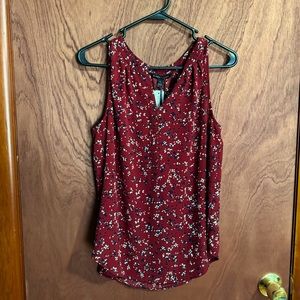 Red sleeveless blouse by 41 Hawthorn
